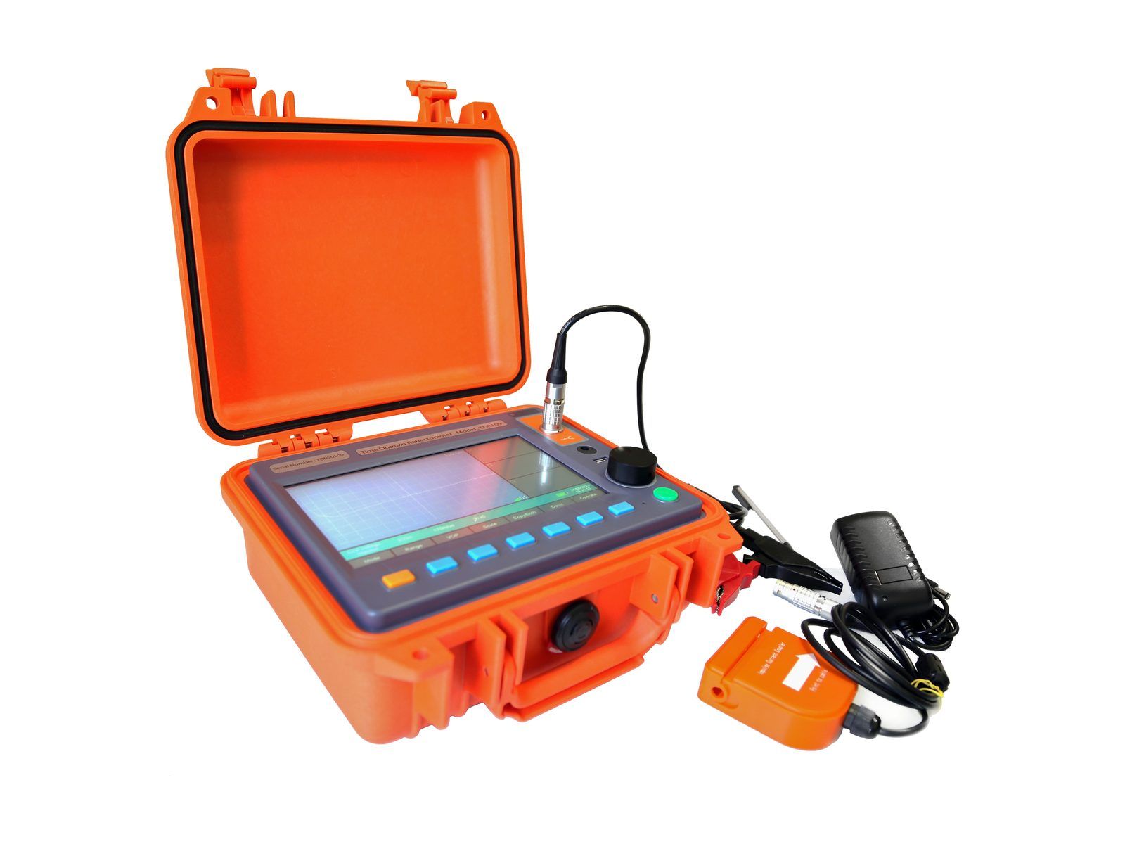 TDR-901 with its kit: a test lead plugged into the front socket, red and black clip leads, a mains adapter and an orange impulse current coupler.